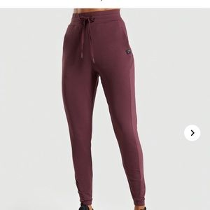 Gymshark aura joggers (berry red - maroon)